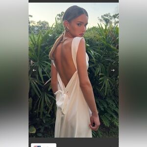 Elegant White Backless Satin Dress with Bow Detail